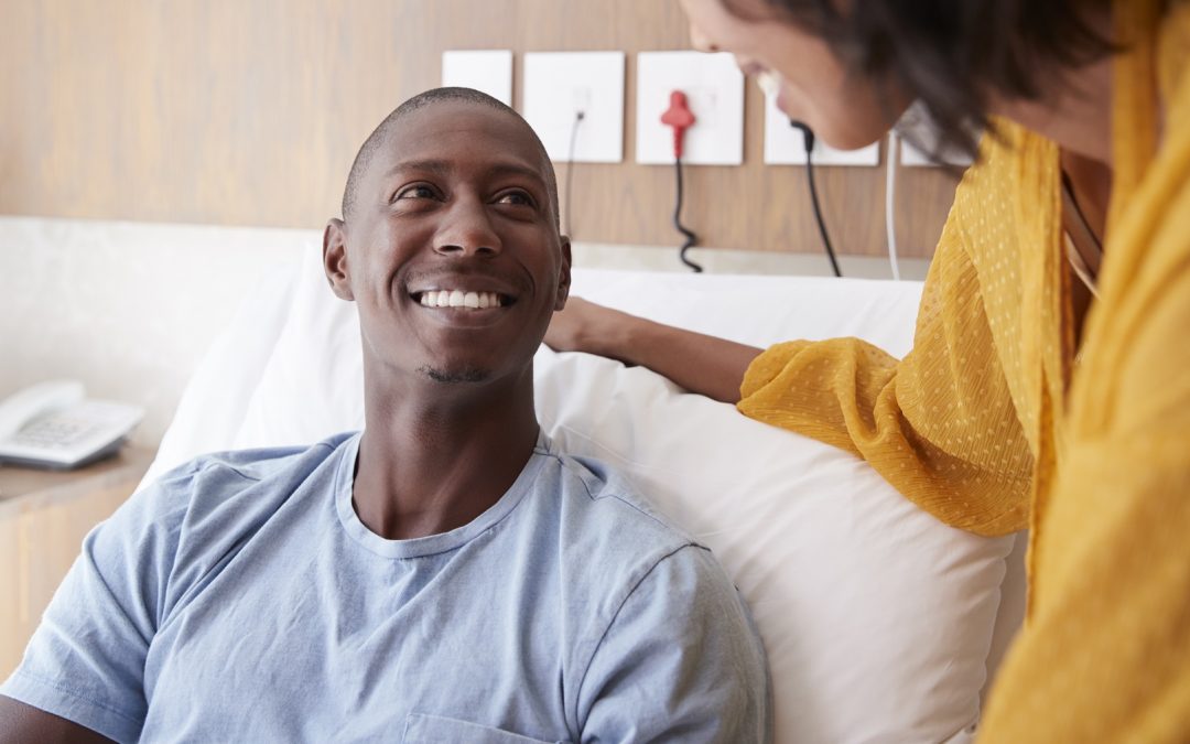 Wife Visiting And Talking With Patient Husband In Hospital Bed | stemcellmia