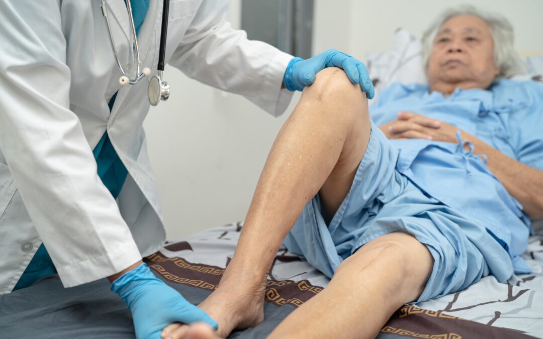 Asian doctor physiotherapist examining massaging and treatment, stem Cell